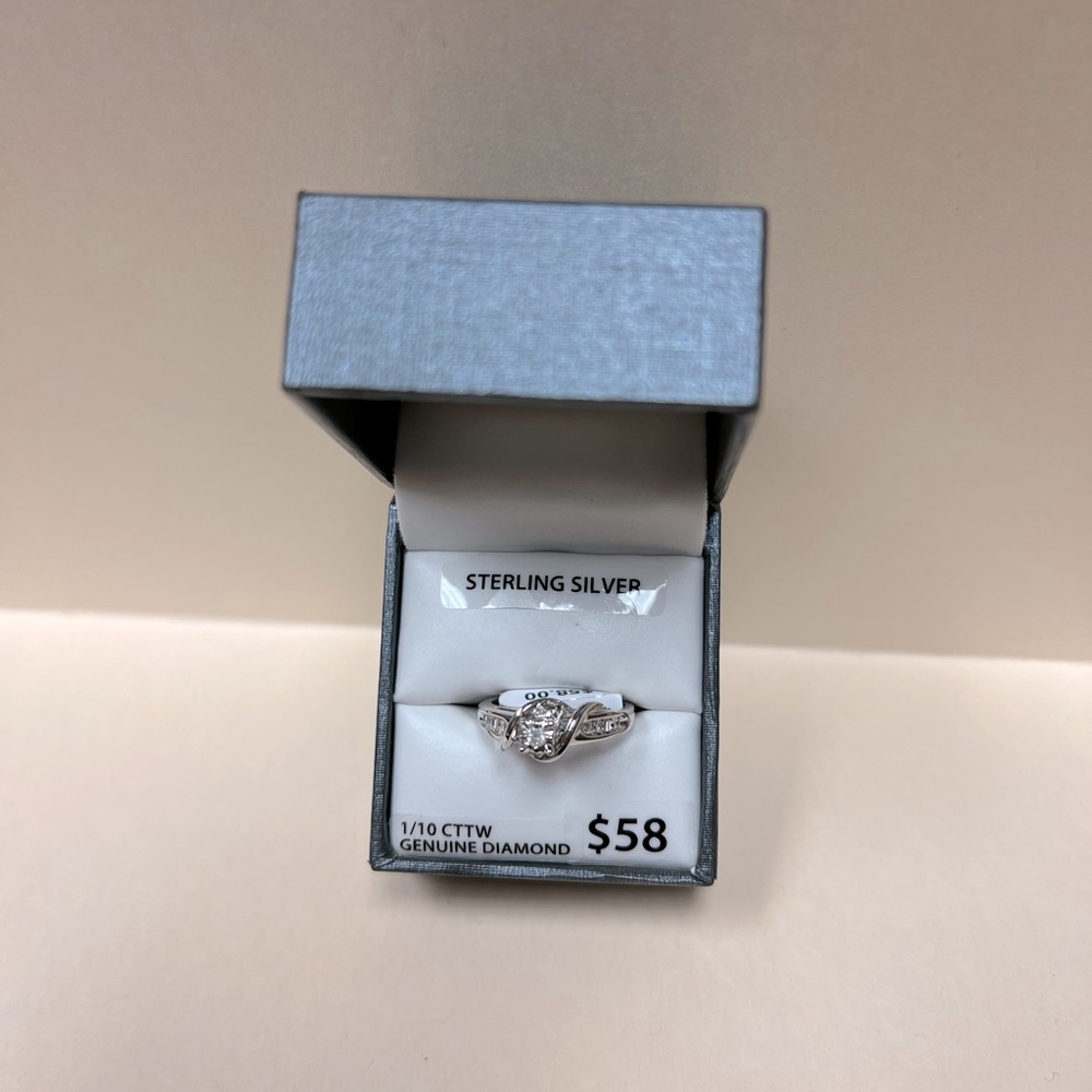 Sterling Silver. Genuine diamonds.
